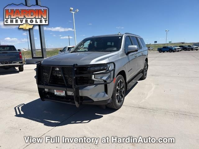 2023 Chevrolet Suburban 4WD RST in Sterling Gray Metallic — front three-quarter view