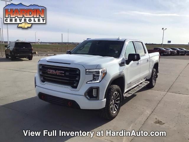 2021 GMC Sierra 1500 Crew Cab Short Box 4-Wheel Drive AT4 in Summit White — front three-quarter view