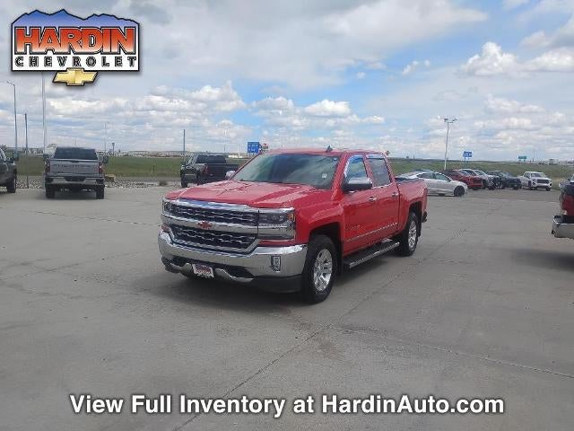 2016 Chevrolet Silverado 1500 Crew Cab Short Box 4-Wheel Drive LTZ in Red Hot — front three-quarter view